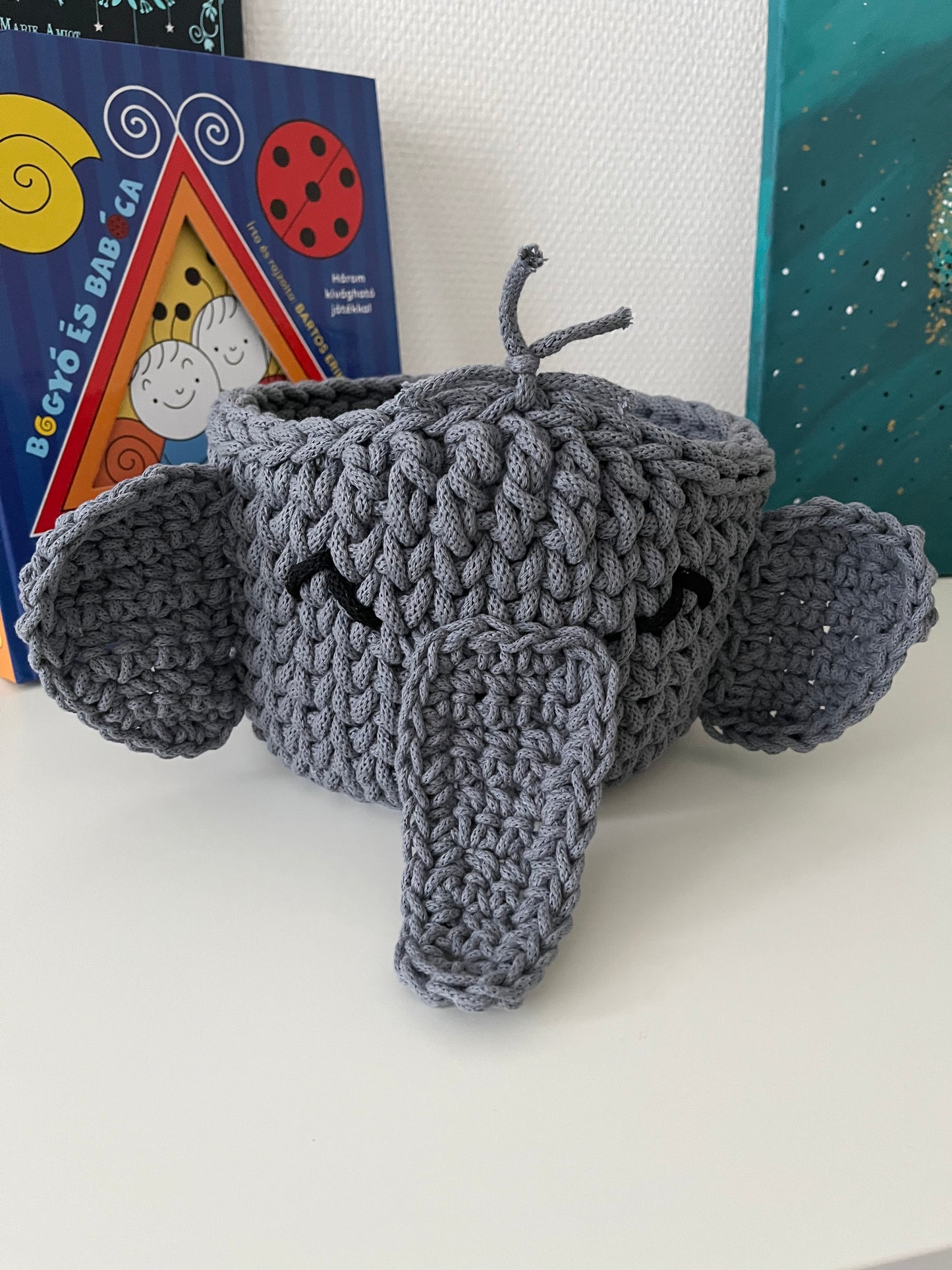 Handmade elephant basket made from recycled cotton cord for toy storage in kids room