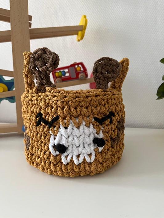 Handmade giraffe basket made from recycled cotton cord for toy storage in kids room