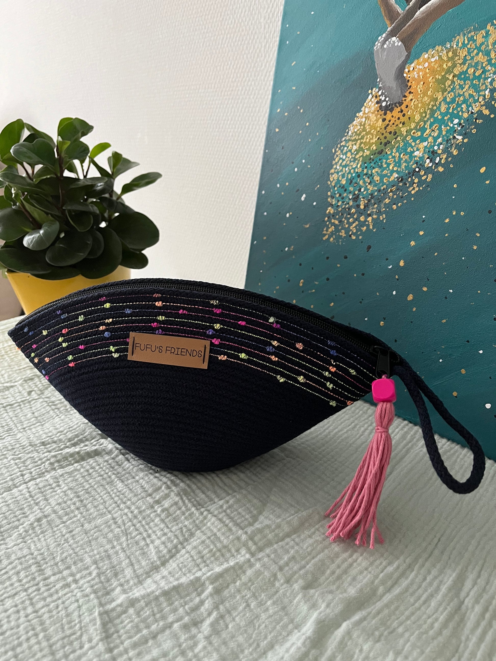 Handmade shell-shaped cord pouch in Boho Navy Blue with zipper closure.