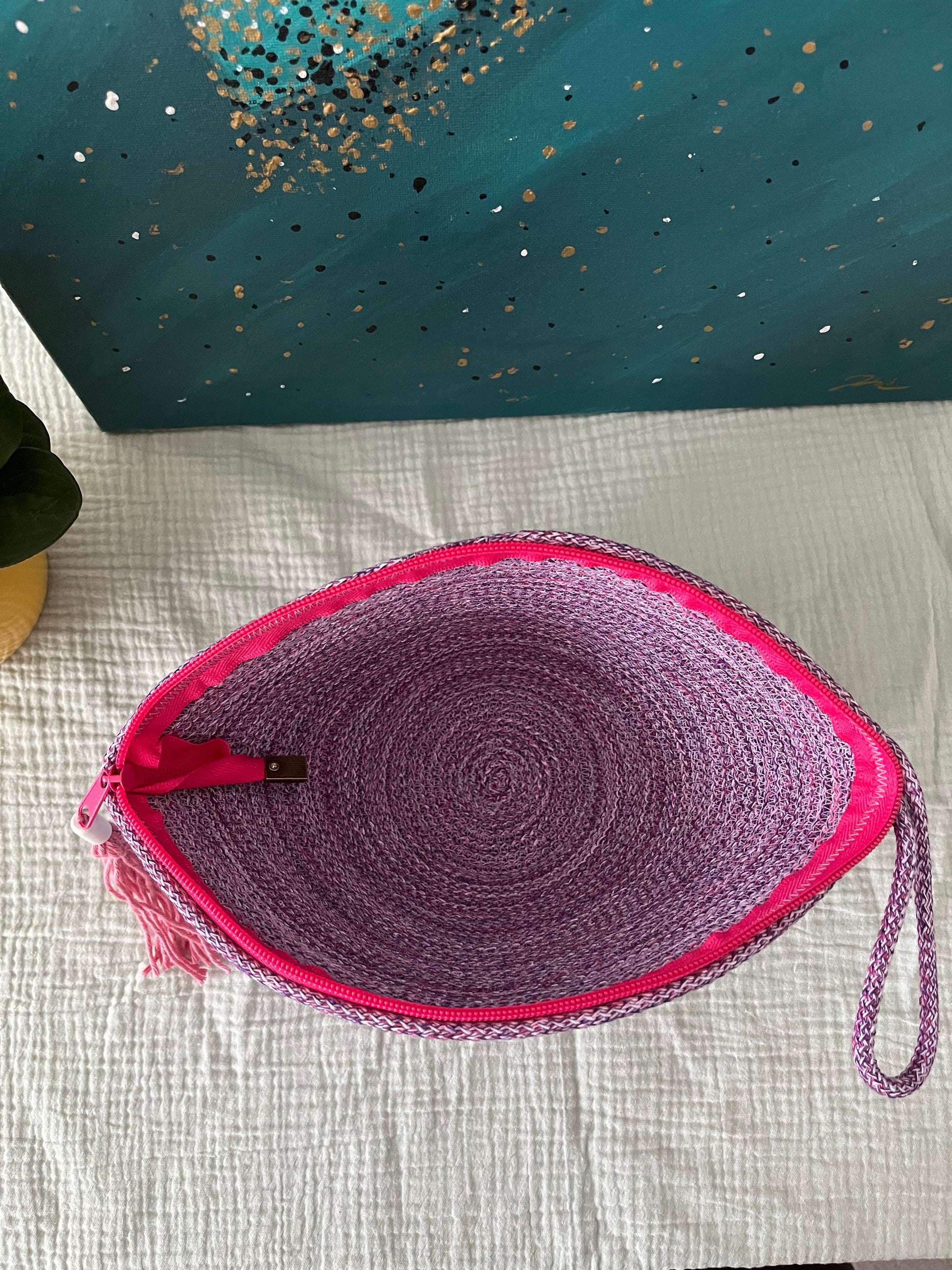 Structured shell pouch with decorative textured detail in Festival colours.