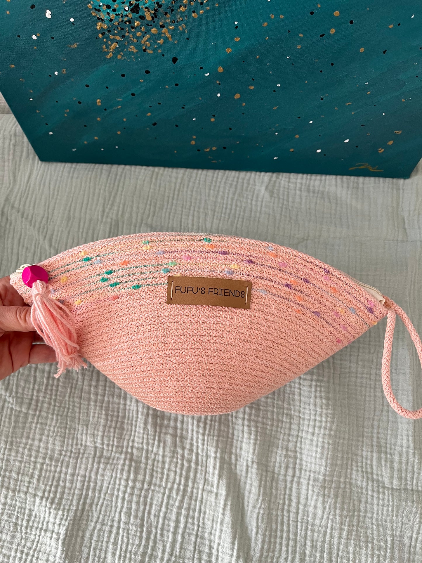 Makeup bag made from OEKO-TEX certified cord in soft pink.