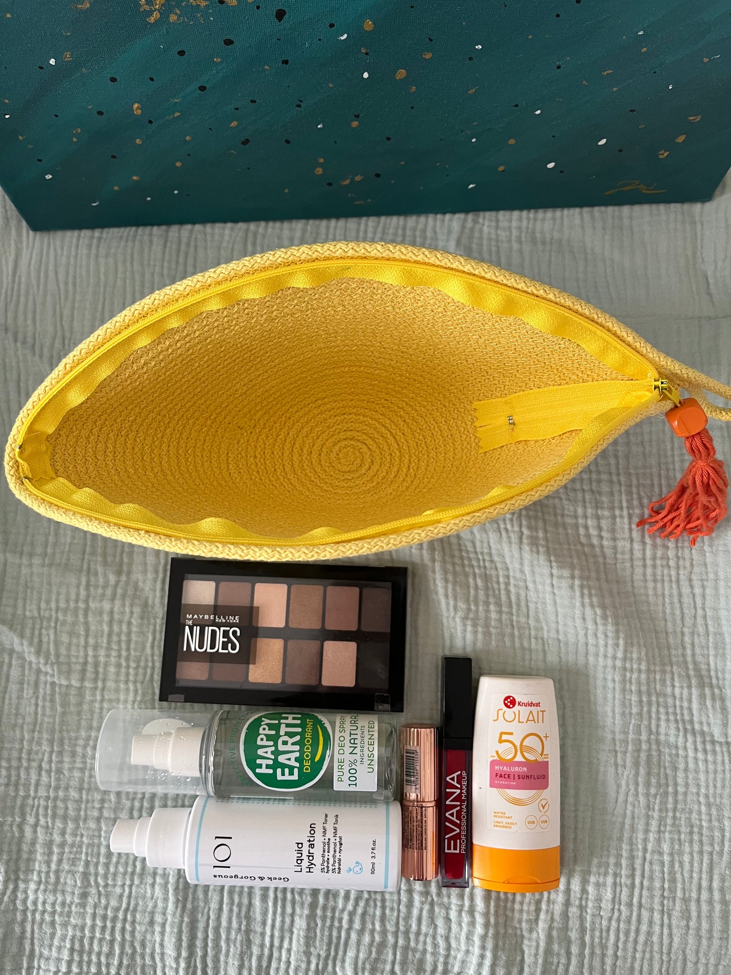 Yellow zipper pouch designed for practical everyday organisation.